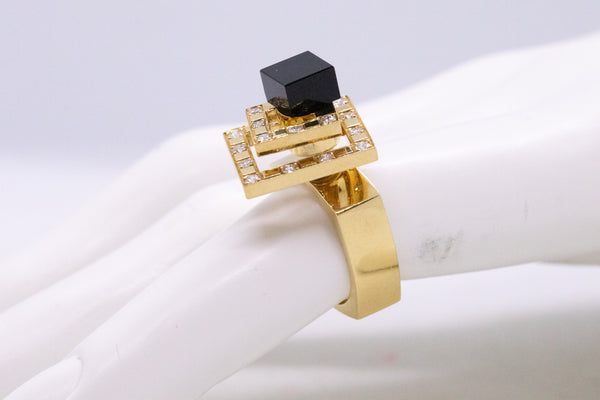 NORMAN TEUFEL 1972 KINETIC 18 KT SPINNER RING WITH DIAMONDS AND ONYX