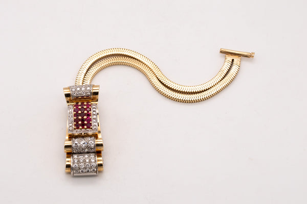 *Art-Deco 1940's bracelet wristwatch in 18 kt gold with 9.66 Ctw of diamonds & rubies