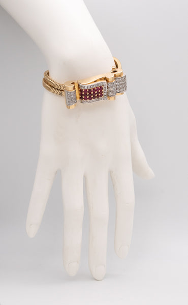 *Art-Deco 1940's bracelet wristwatch in 18 kt gold with 9.66 Ctw of diamonds & rubies