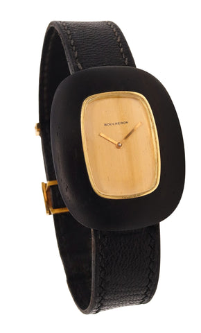 *Boucheron 1970 Paris bracelet wristwatch in 18 kt yellow gold with ebony wood