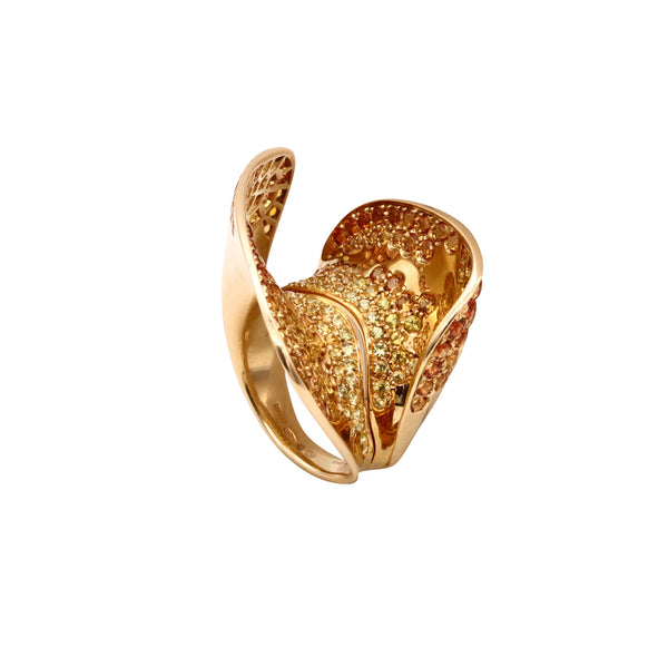 *Versace Milan sculptural ring in 18 kt yellow gold with 8.64 Ctw in sapphires