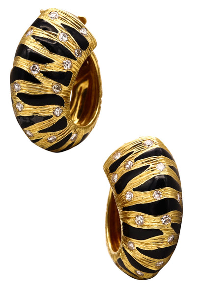 *Fred of Paris 1970’s earrings in 18 kt yellow gold with diamonds and black enamel