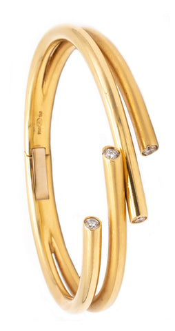 *Gubelin 1970 Swiss tubular bangle bracelet in 18 kt yellow gold with VS diamonds