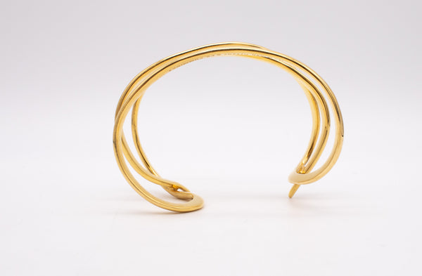 *Tiffany & Co 1980 by Angela Cummings Twisted wired cuff in solid 18 kt yellow gold