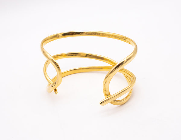 *Tiffany & Co 1980 by Angela Cummings Twisted wired cuff in solid 18 kt yellow gold