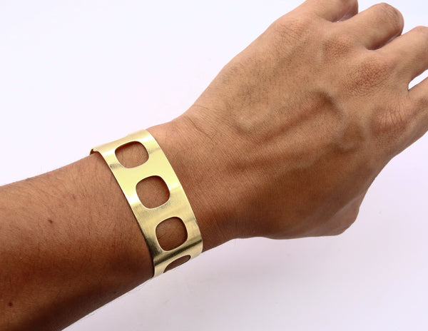 *Cartier Paris 1968 by Jean Dinh Van a Rare geometric bracelet cuff in solid 18 kt yellow gold