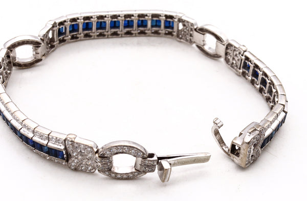 *Art Deco stations bracelet in 18 kt white gold with 7.26 Cts in VS diamonds and blue sapphires