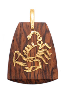 *Swiss 1970's Zodiacal Scorpio pendant in 18 kt gold and Macassar ebony
