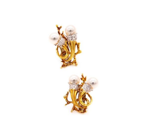 *Torchiere earrings in 18 kt gold and platinum with vs diamonds & white pearls