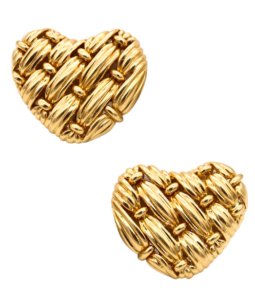 *Tiffany & Co. NYC signature series woven heart earrings in 18 kt yellow gold