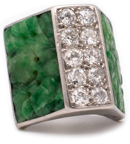 ART DECO 1920 PLATINUM RING WITH 1.50 CTW DIAMONDS AND ANCIENT JADEITE CARVINGS