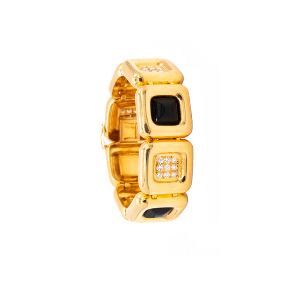 *Cartier 1970's Aldo Cipullo geometric bracelet in 18 kt yellow gold with 2.88 Ctw diamonds & onyx