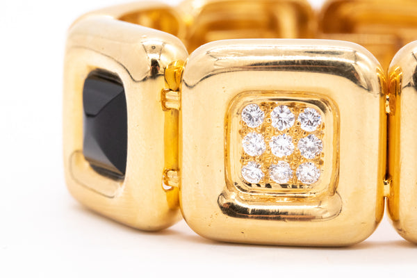 *Cartier 1970's Aldo Cipullo geometric bracelet in 18 kt yellow gold with 2.88 Ctw diamonds & onyx