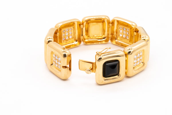 *Cartier 1970's Aldo Cipullo geometric bracelet in 18 kt yellow gold with 2.88 Ctw diamonds & onyx