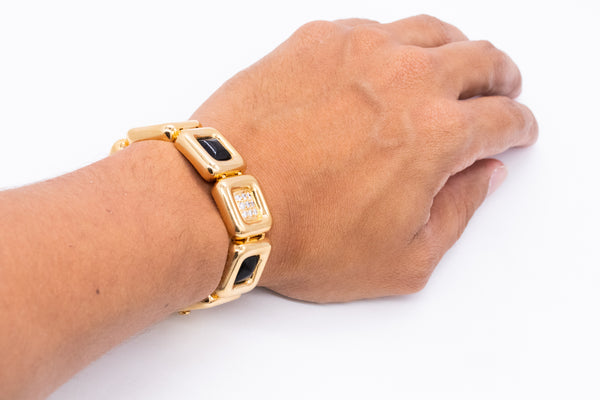 *Cartier 1970's Aldo Cipullo geometric bracelet in 18 kt yellow gold with 2.88 Ctw diamonds & onyx