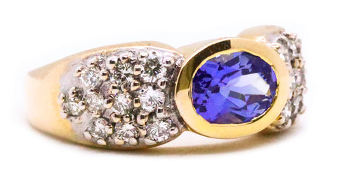 TANZANITE AND DIAMONDS, 14 KT BAND RING