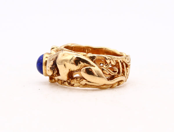 *Van Cleef & Arpels 1969 Paris vintage panthers ring in 18 kt yellow gold with blue sapphire