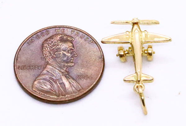 CUTE 14 KT GOLD CHARM PENDANT OF AN AIRPLANE