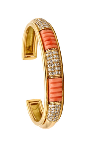 *Boucheron, Paris Pluriel Convertible bracelet in 18 kt gold with 6.30 Cts in diamonds coral & wood