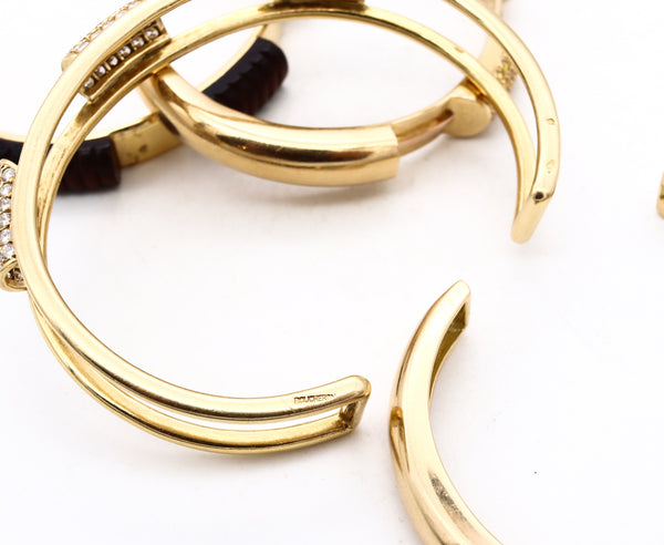 *Boucheron, Paris Pluriel Convertible bracelet in 18 kt gold with 6.30 Cts in diamonds coral & wood