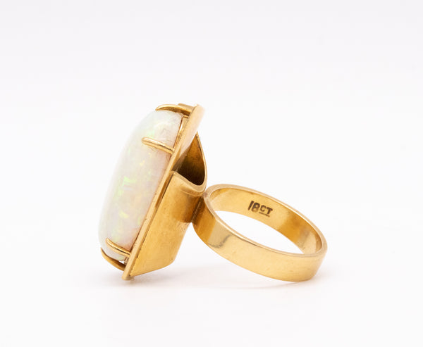 *Modernist geometric cocktail ring in 18 kt yellow gold with 10.86 Cts opal