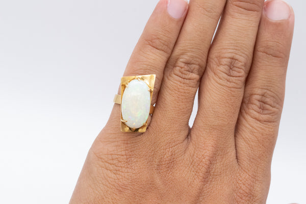 *Modernist geometric cocktail ring in 18 kt yellow gold with 10.86 Cts opal