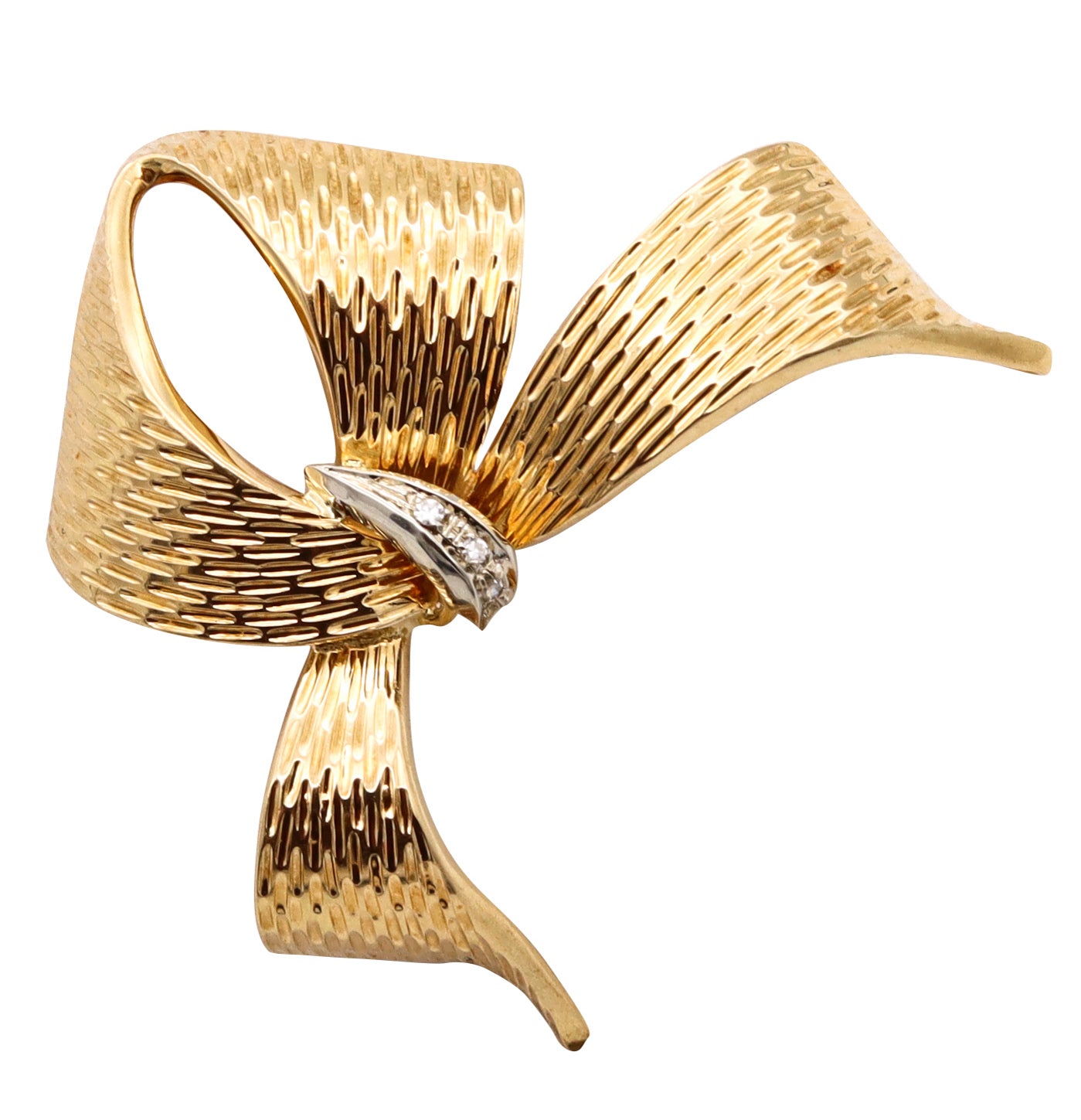 *Cartier 1970 Vintage bow brooch in solid 18 kt yellow gold with VS diamonds