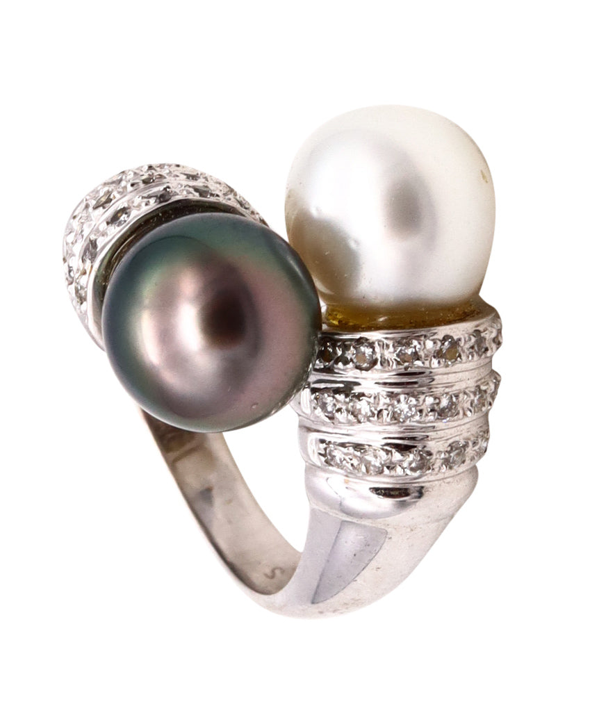 *Modern Toi Et Moy bypass ring in 18 kt white gold with diamonds and Akoya pearls