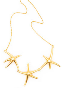 *Tiffany & Co. 1980's by Elsa Peretti 18 kt yellow gold necklace chain with three starfish