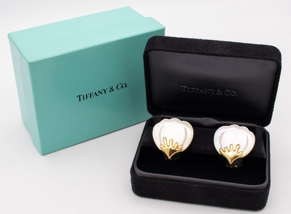 *Tiffany & Co. by Angela Cummings Petals earrings in 18 kt yellow gold with white nacre