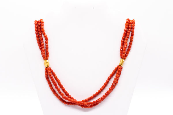 *Italian 1960 Mid-century necklace in 18 kt yellow gold with three strands of Sardinian red coral