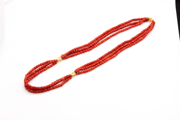 *Italian 1960 Mid-century necklace in 18 kt yellow gold with three strands of Sardinian red coral