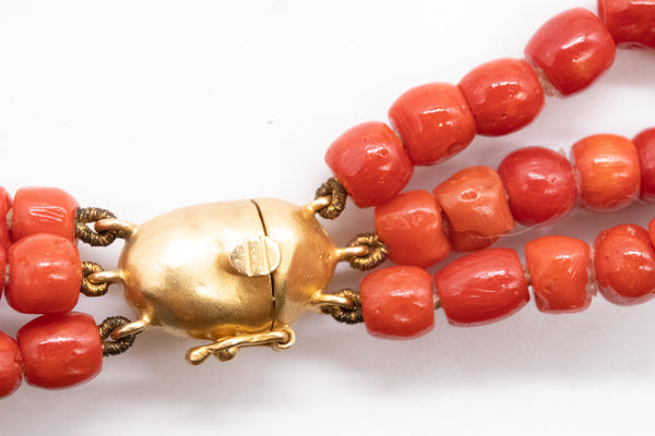 *Italian 1960 Mid-century necklace in 18 kt yellow gold with three strands of Sardinian red coral