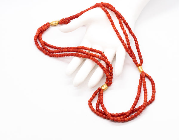 *Italian 1960 Mid-century necklace in 18 kt yellow gold with three strands of Sardinian red coral