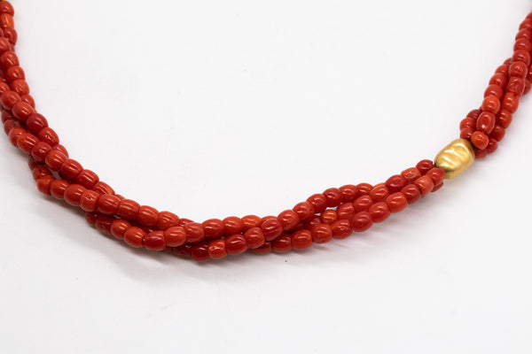 *Italian 1960 Mid-century necklace in 18 kt yellow gold with three strands of Sardinian red coral