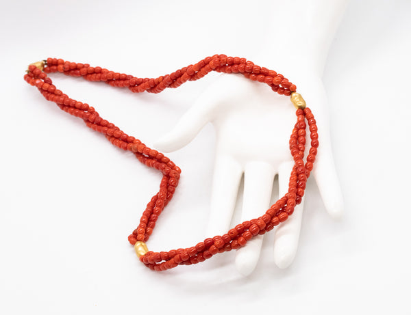 *Italian 1960 Mid-century necklace in 18 kt yellow gold with three strands of Sardinian red coral