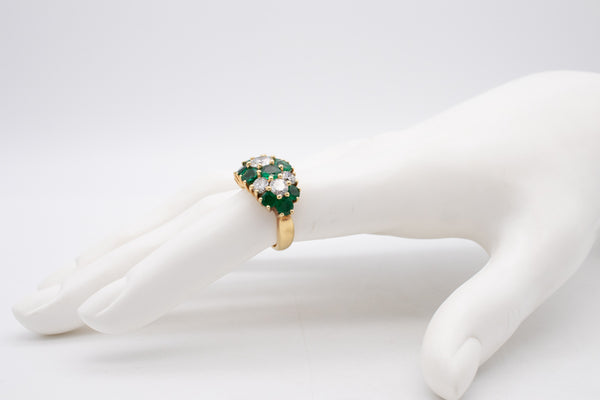 KUTCHINSKY 1970'S LONDON EXCEPTIONAL 18 KT RING WITH 5.17 Ctw IN DIAMONDS & EMERALDS