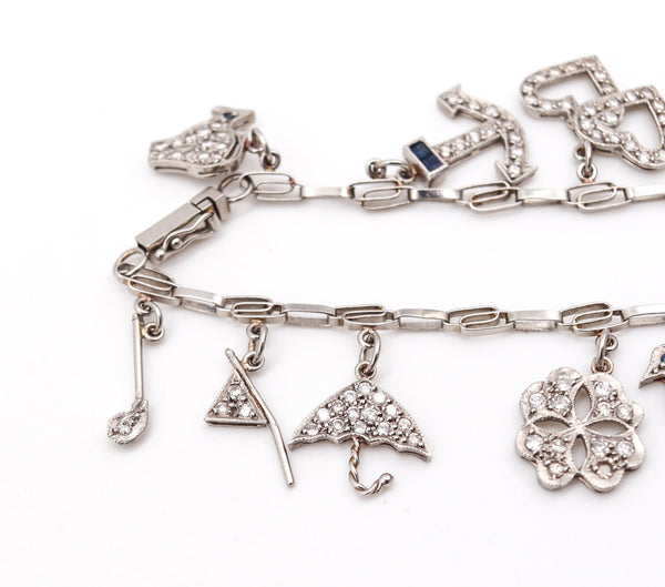 Art Deco 1930 Eleven Charms Bracelet In Platinum Enamel With 3.48 Ctw In Diamonds And Gems