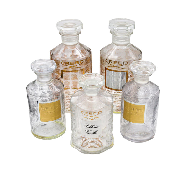 *France Creed a suite of 5 Large presentation Perfume crystal bottles for display