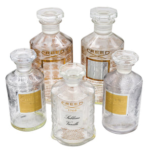 *France Creed a suite of 5 Large presentation Perfume crystal bottles for display
