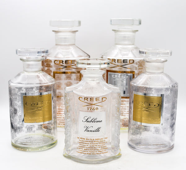 *France Creed a suite of 5 Large presentation Perfume crystal bottles for display