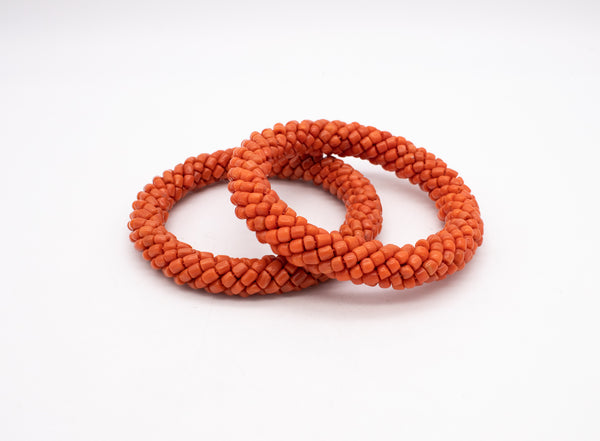 ITALIAN 1960 MODERN PAIR OF BANGLES WITH NATURAL SARDINIAN RED CORALS