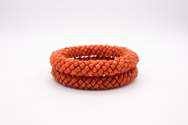 ITALIAN 1960 MODERN PAIR OF BANGLES WITH NATURAL SARDINIAN RED CORALS