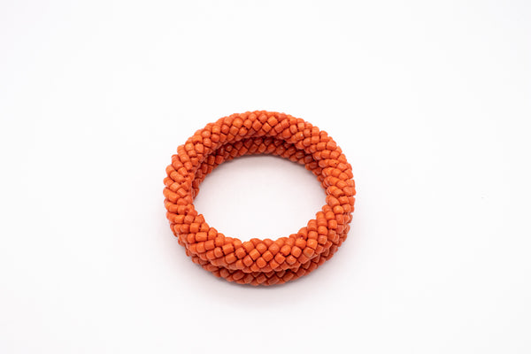 ITALIAN 1960 MODERN PAIR OF BANGLES WITH NATURAL SARDINIAN RED CORALS