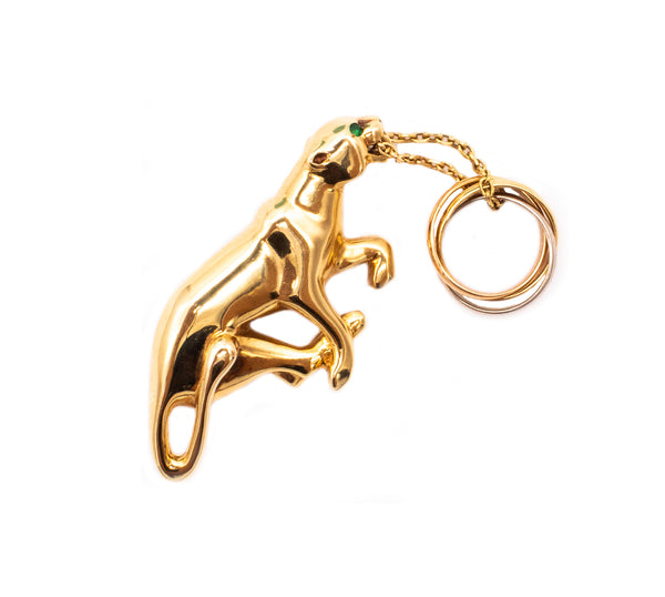 CARTIER PARIS 18 KT YELLOW GOLD PANTHERE TRINITY BROOCH WITH TSAVORITES