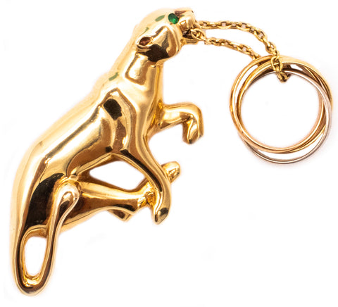 *Cartier Paris Panthere Trinity brooch in 18 kt yellow gold with mini trinity ring & Tsavorites