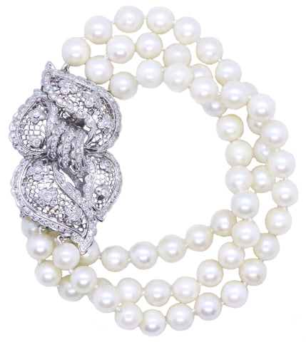 PEARLS BRACELET IN 14 KT WITH DIAMONDS CONVERTIBLE INTO BROOCH