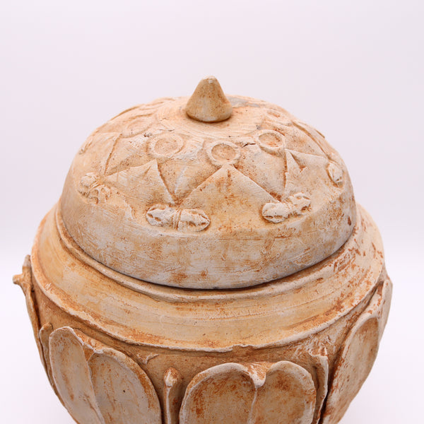+China 618-907 AD Tang Dynasty Period offering vessel with 8 lotus petals in earthenware cream pottery