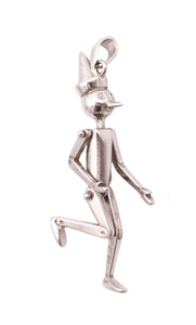 UNOAERRE 1970'S VINTAGE ARTICULATED PINOCCHIO PENDANT IN .925 STERLING SILVER