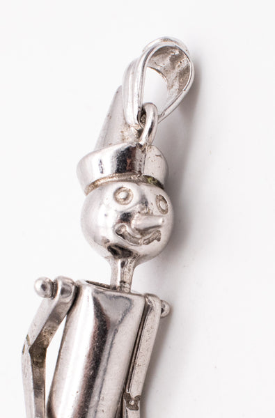 UNOAERRE 1970'S VINTAGE ARTICULATED PINOCCHIO PENDANT IN .925 STERLING SILVER